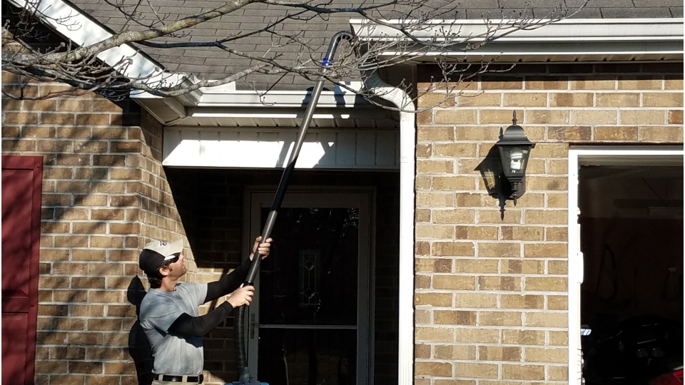vacuum in gutter with camera attached