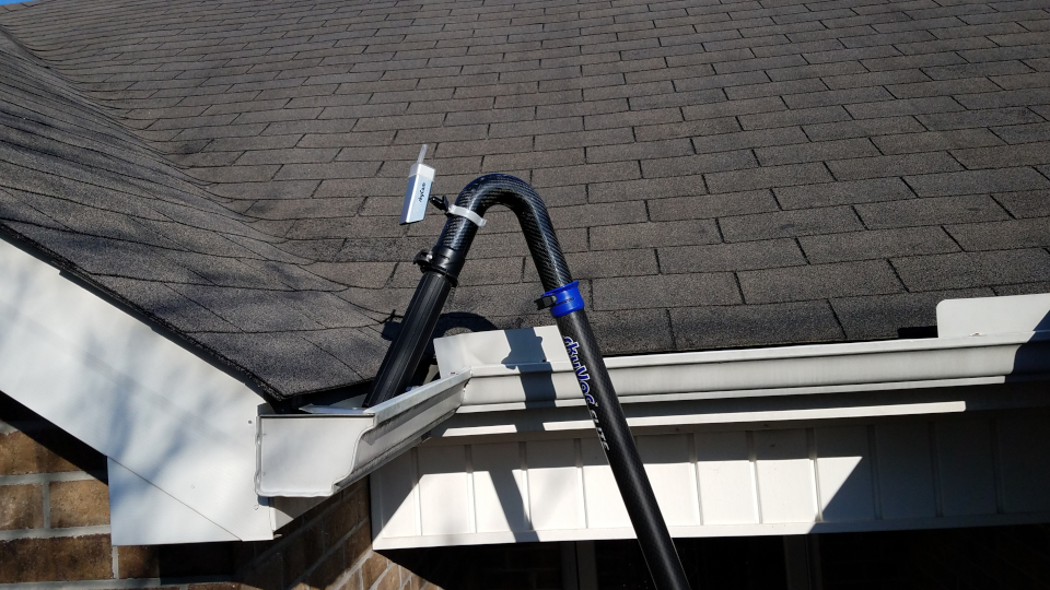vacuum in gutter with camera attached
